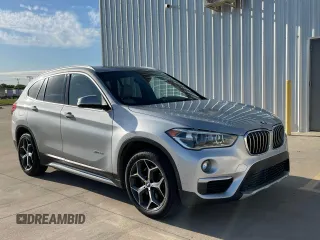 2017 BMW X1 sDrive28i with VIN WBXHU7C39H5H34971, listed as a Copart auction lot 51869265 with 108,051 mi miles and Clean Title. Bid and sale history available at carsss.com. Image 1.