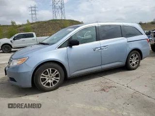 2013 Honda Odyssey EX-L with VIN 5FNRL5H61DB086978, listed as a Copart auction lot 52627995 with 120,687 mi miles and Salvage title. Bid and sale history available at DreamBid. Image 1.