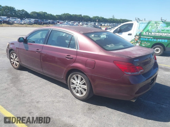 2008 Toyota Avalon XL with VIN 4T1BK36BX8U309181, listed as a IAAI auction lot 41819670 with 227,129 mi miles. Bid and sale history available at carsss.com. Image 3.
