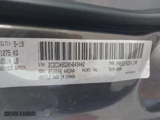 2019 Dodge Charger SXT with VIN 2C3CDXBG2KH643442, listed as a IAAI auction lot 41896681 with 104,061 mi miles. Bid and sale history available at carsss.com. Image 9.