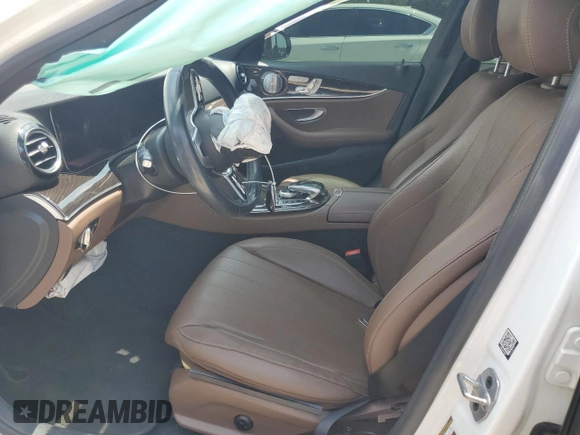 2019 Mercedes-Benz E 300 with VIN WDDZF4JB8KA645219, listed as a Copart auction lot 59702515 with 55,117 mi miles and Salvage title. Bid and sale history available at DreamBid. Image 7.