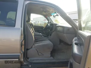 2003 Chevrolet Tahoe LS with VIN 1GNEK13V03J154985, listed as a IAAI auction lot 41708954 with 203,826 mi miles and . Bid and sale history available at DreamBid. Image 5.