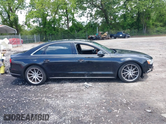 2015 Audi A8 3.0T with VIN WAU3GAFD6FN008993, listed as a IAAI auction lot 42239421 with 125,587 mi miles and . Bid and sale history available at DreamBid. Image 13.