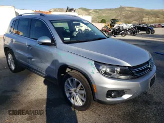 2012 Volkswagen Tiguan LE with VIN WVGAV7AX2CW580035, listed as a Copart auction lot 47297205 with 118,211 mi miles and Salvage title. Bid and sale history available at DreamBid. Image 4.