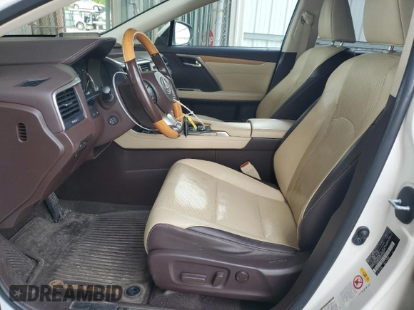 2016 Lexus RX 350 with VIN JTJBZMCA8G2003217, listed as a Copart auction lot 56563635 with 113,581 mi miles and Salvage title. Bid and sale history available at DreamBid. Image 7.