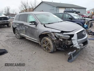 2019 Infiniti QX60 LUXE with VIN 5N1DL0MN4KC528751, listed as a IAAI auction lot 41076594 with 120,452 mi miles. Bid and sale history available at carsss.com. Image 1.