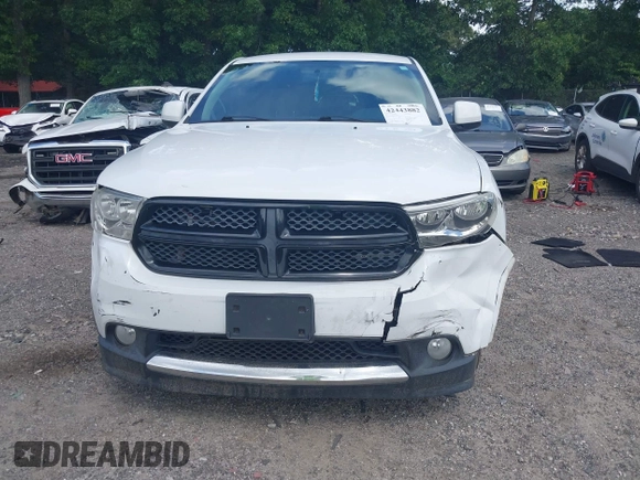 2013 Dodge Durango Special Service z VIN 1C4RDJFG4DC675358, wystawiony jako IAAI lot #42443882 z przebiegiem 94 889 mil mil oraz . Historia ofert i sprzedaży dostępna na DreamBid. Obrazek 12.