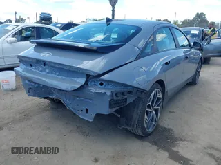 2023 Hyundai Ioniq 6 SEL z VIN KMHM34AA5PA033700, wystawiony jako IAAI lot #41954862 z przebiegiem 16 304 mil mil oraz . Historia ofert i sprzedaży dostępna na DreamBid. Obrazek 4.