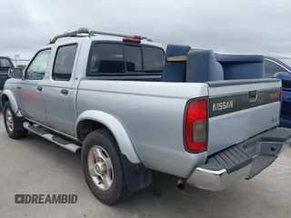 2000 Nissan Frontier XE with VIN 1N6ED27T2YC425703, listed as a IAAI auction lot 42687301 with 186,317 mi miles and . Bid and sale history available at DreamBid. Image 3.