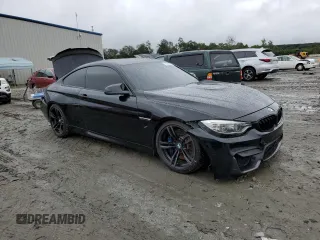 2015 BMW M4 with VIN WBS3R9C51FK330380, listed as a Copart auction lot 71764224 with 126,040 mi miles and Salvage Title. Bid and sale history available at carsss.com. Image 4.