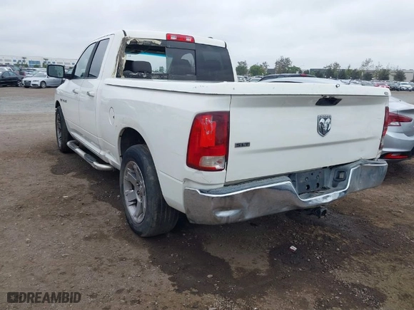 2009 Dodge Ram 1500 SLT with VIN 1D3HB18T69S812221, listed as a IAAI auction lot 40715494 with 306,416 mi miles. Bid and sale history available at carsss.com. Image 3.