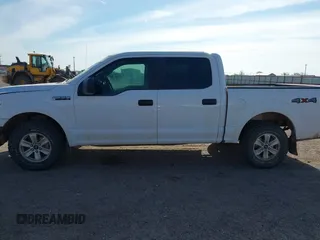 2019 Ford F-150 XL with VIN 1FTEW1E52KKC94894, listed as a IAAI auction lot 41880412 with 133,355 mi miles. Bid and sale history available at carsss.com. Image 14.