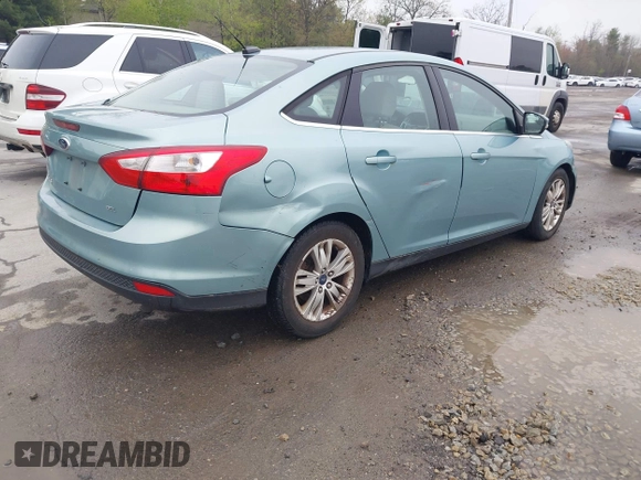 2012 Ford Focus SEL with VIN 1FAHP3H29CL430964, listed as a IAAI auction lot 42186057 with 122,279 mi miles. Bid and sale history available at carsss.com. Image 4.