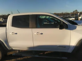 2023 GMC Canyon 4WD AT4 with VIN 1GTP6DEK0P1260420, listed as a IAAI auction lot 41864560 with 1 mi miles. Bid and sale history available at carsss.com. Image 13.
