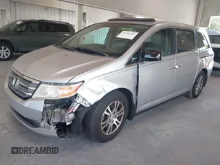 2012 Honda Odyssey EX-L with VIN 5FNRL5H67CB005013, listed as a IAAI auction lot 42295586 with 200,611 mi miles and . Bid and sale history available at DreamBid. Image 17.