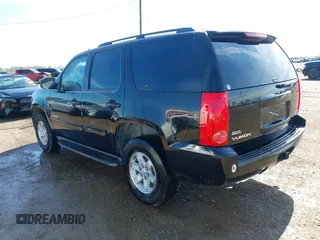 2011 GMC Yukon SLE with VIN 1GKS1AE01BR108215, listed as a IAAI auction lot 41379402 with 195,171 mi miles. Bid and sale history available at carsss.com. Image 3.