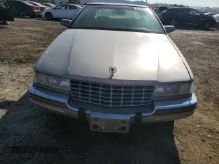 1997 Cadillac Seville Luxury SLS with VIN 1G6KS52Y0VU801906, listed as a Copart auction lot 65169364 with 191,627 mi miles and Salvage Title. Bid and sale history available at carsss.com. Image 5.