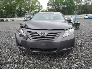 2009 Toyota Camry LE z VIN 4T1BK46K69U091909, wystawiony jako Copart lot #56214505 z przebiegiem 157 133 mil mil oraz Czysty tytuł • Clean title. Historia ofert i sprzedaży dostępna na DreamBid. Obrazek 5.