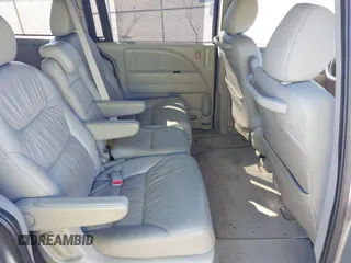 2009 Honda Odyssey EX-L with VIN 5FNRL38729B032786, listed as a IAAI auction lot 42012590 with 188,552 mi miles. Bid and sale history available at carsss.com. Image 8.