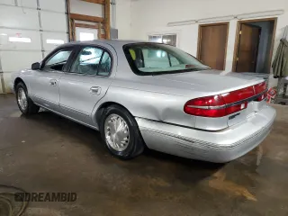 1997 Lincoln Continental with VIN 1LNLM97V0VY672751, listed as a Copart auction lot 89367315 with 132,659 mi miles and Salvage Title. Bid and sale history available at carsss.com. Image 2.
