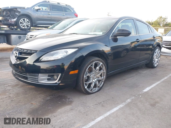 2012 Mazda 6 i Touring with VIN 1YVHZ8DH8C5M24163, listed as a IAAI auction lot 42139018 with 223,844 mi miles and . Bid and sale history available at DreamBid. Image 2.