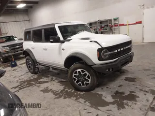 2021 Ford Bronco with VIN 1FMEE5DP6MLA71957, listed as a IAAI auction lot 41587072 with 42,896 mi miles and . Bid and sale history available at DreamBid. Image 1.