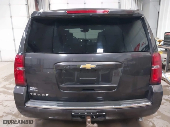 2016 Chevrolet Tahoe LTZ with VIN 1GNSKCKC7GR455033, listed as a IAAI auction lot 40811560 with 165,845 mi miles. Bid and sale history available at carsss.com. Image 16.