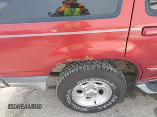 1998 Ford Explorer XL z VIN 1FMZU34E2WZB30557, wystawiony jako IAAI lot #41597870 z przebiegiem 164 778 mil mil oraz . Historia ofert i sprzedaży dostępna na DreamBid. Obrazek 6.
