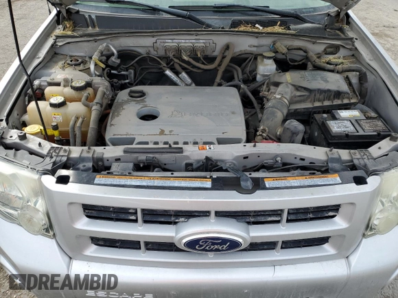 2011 Ford Escape Hybrid z VIN 1FMCU4K35BKA08355, wystawiony jako Copart lot #49155955 z przebiegiem 80 953 mil mil oraz Szkoda całkowita • Salvage title. Historia ofert i sprzedaży dostępna na DreamBid. Obrazek 12.