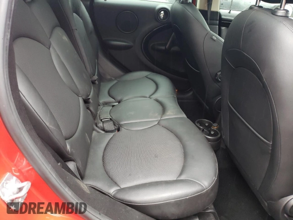 2014 MINI Countryman S with VIN WMWZC3C52EWP25379, listed as a Copart auction lot 61438355 with 76,943 mi miles and Salvage title. Bid and sale history available at DreamBid. Image 11.