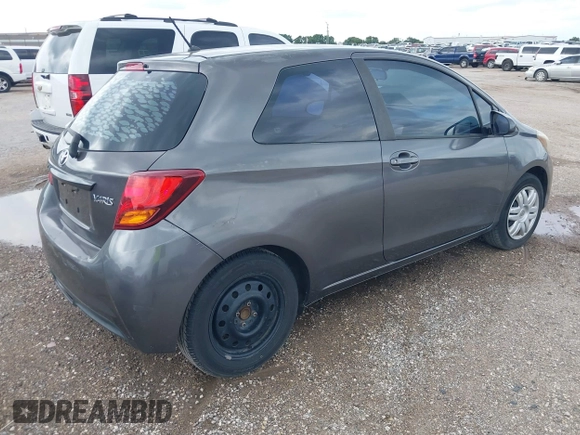 2015 Toyota Yaris L with VIN VNKJTUD33FA054166, listed as a IAAI auction lot 41993354 with 98,657 mi miles and . Bid and sale history available at DreamBid. Image 4.