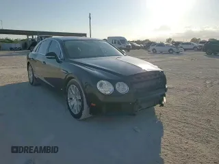 2014 Bentley Flying Spur z VIN SCBEC9ZA2EC090466, wystawiony jako Copart lot #43833305 z przebiegiem 53 837 mil mil oraz Szkody całkowita. Historia ofert i sprzedaży dostępna na DreamBid. Obrazek 14.
