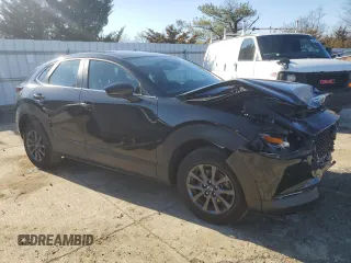 2024 Mazda CX-30 S with VIN 3MVDMBAM0RM635991, listed as a Copart auction lot 48979595 with 11,640 mi miles and Salvage title. Bid and sale history available at DreamBid. Image 4.