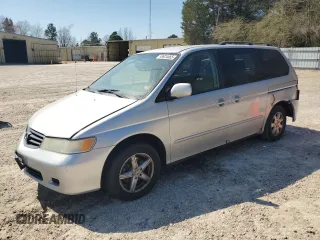 2004 Honda Odyssey EX-L with VIN 5FNRL18974B074613, listed as a Copart auction lot 48924865 with 212,633 mi miles and Salvage Title. Bid and sale history available at DreamBid. Image 1.