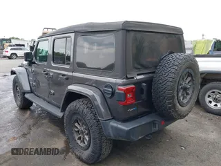 2021 Jeep Wrangler Unlimited Sahara with VIN 1C4JJXP60MW704738, listed as a IAAI auction lot 42042079 with 63,765 mi miles and . Bid and sale history available at DreamBid. Image 3.