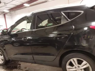 2013 Hyundai Tucson GLS with VIN KM8JU3AC0DU754948, listed as a IAAI auction lot 41811891 with 139,056 mi miles. Bid and sale history available at carsss.com. Image 14.
