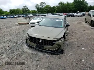 2023 Mazda CX-50 Premium Plus with VIN 7MMVABEY6PN113039, listed as a Copart auction lot 61629645 with 55,759 mi miles and Salvage title. Bid and sale history available at DreamBid. Image 15.