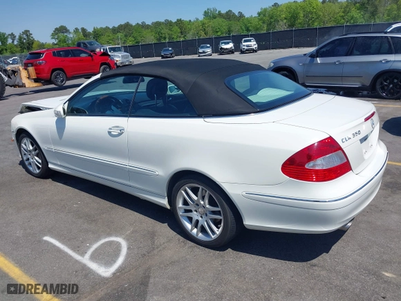 2009 Mercedes-Benz CLK-Class 3.5L with VIN WDBTK56F09T104434, listed as a IAAI auction lot 41976340 with 58,710 mi miles. Bid and sale history available at carsss.com. Image 3.