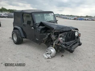 2000 Jeep Wrangler Sport with VIN 1J4FA49S9YP743515, listed as a Copart auction lot 53906305 with 247,349 mi miles and Salvage title. Bid and sale history available at DreamBid. Image 4.