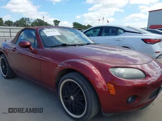 2006 Mazda MX-5 Miata Touring with VIN JM1NC25F960104131, listed as a IAAI auction lot 42818426 with 118,085 mi miles and . Bid and sale history available at DreamBid. Image 1.