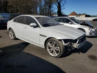 2017 Jaguar XF with VIN SAJBL4BV8HCY34982, listed as a Copart auction lot 79397414 with 96,672 mi miles and Salvage Title. Bid and sale history available at DreamBid. Image 4.