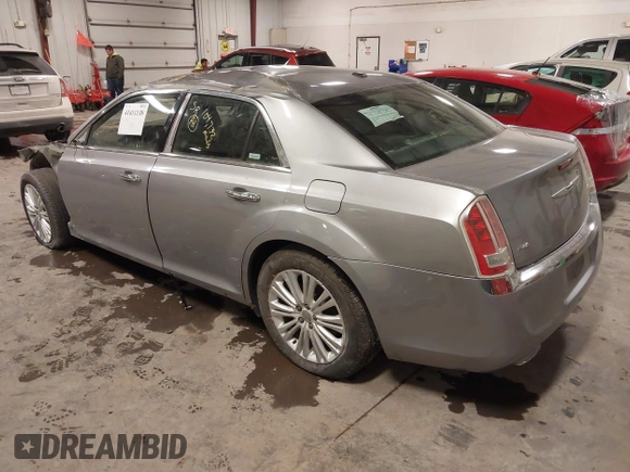 2013 Chrysler 300 with VIN 2C3CCAKT9DH581098, listed as a IAAI auction lot 41411138 with 104,732 mi miles. Bid and sale history available at carsss.com. Image 3.