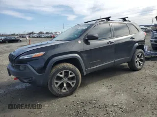 2014 Jeep Cherokee Trailhawk with VIN 1C4PJMBS9EW159993, listed as a Copart auction lot 46935105 with 128,140 mi miles and Salvage Title. Bid and sale history available at carsss.com. Image 1.