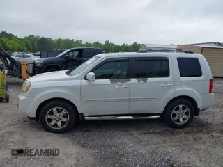 2011 Honda Pilot Touring z VIN 5FNYF4H9XBB053966, wystawiony jako IAAI lot #42148528 z przebiegiem 191 939 mil mil oraz . Historia ofert i sprzedaży dostępna na DreamBid. Obrazek 14.