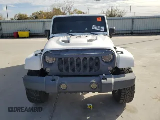 2015 Jeep Wrangler Unlimited Sahara with VIN 1C4BJWEG0FL649724, listed as a Copart auction lot 82189494 with 84,161 mi miles and Salvage Title. Bid and sale history available at carsss.com. Image 5.