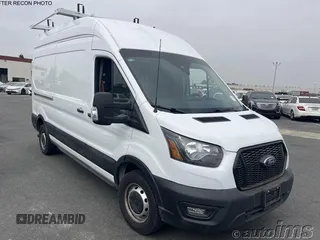 2023 Ford Transit Cargo with VIN 1FTBR1X87PKC09329, listed as a IAAI auction lot 42730748 with 10,638 mi miles and . Bid and sale history available at DreamBid. Image 3.