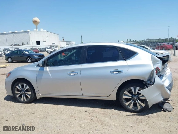 2019 Nissan Sentra S with VIN 3N1AB7AP2KY203809, listed as a IAAI auction lot 42026306 with 73,424 mi miles. Bid and sale history available at carsss.com. Image 14.