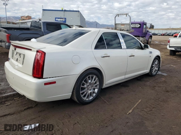 2010 Cadillac STS AWD z VIN 1G6DU6EV1A0150801, wystawiony jako Copart lot #42761515 z przebiegiem 154 865 mil mil oraz Szkoda całkowita • Salvage title. Historia ofert i sprzedaży dostępna na DreamBid. Obrazek 3.