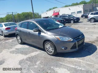 2012 Ford Focus SEL with VIN 1FAHP3M27CL399204, listed as a IAAI auction lot 41980976 with 113,443 mi miles. Bid and sale history available at carsss.com. Image 1.
