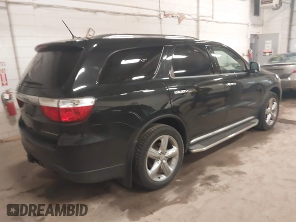 2013 Dodge Durango Citadel with VIN 1C4SDJET9DC661861, listed as a IAAI auction lot 42597126 with 187,631 mi miles and . Bid and sale history available at DreamBid. Image 4.